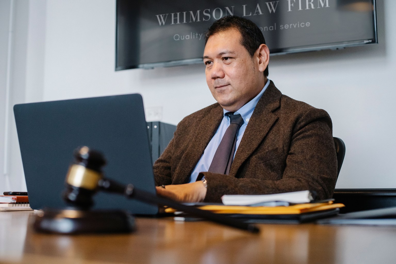 A commercial attorney working at a desk