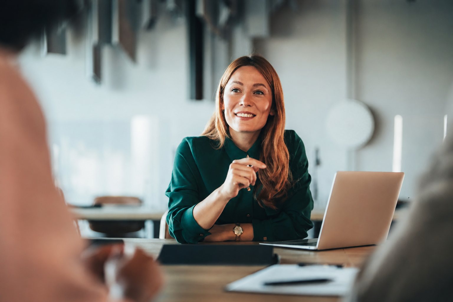 A transactions professional speaking with a client