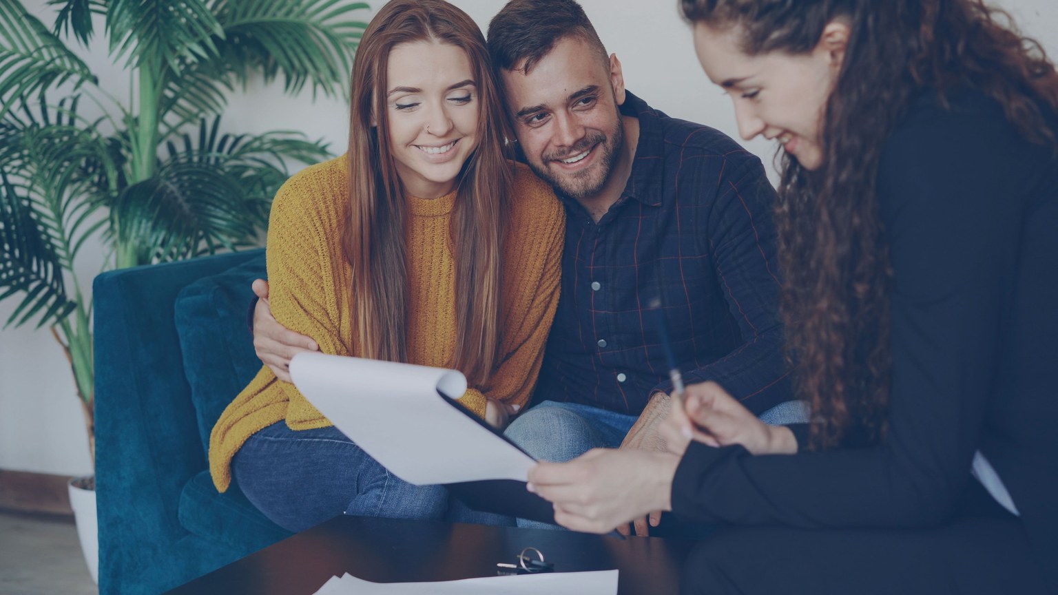 A couple in a confidential financial consultation