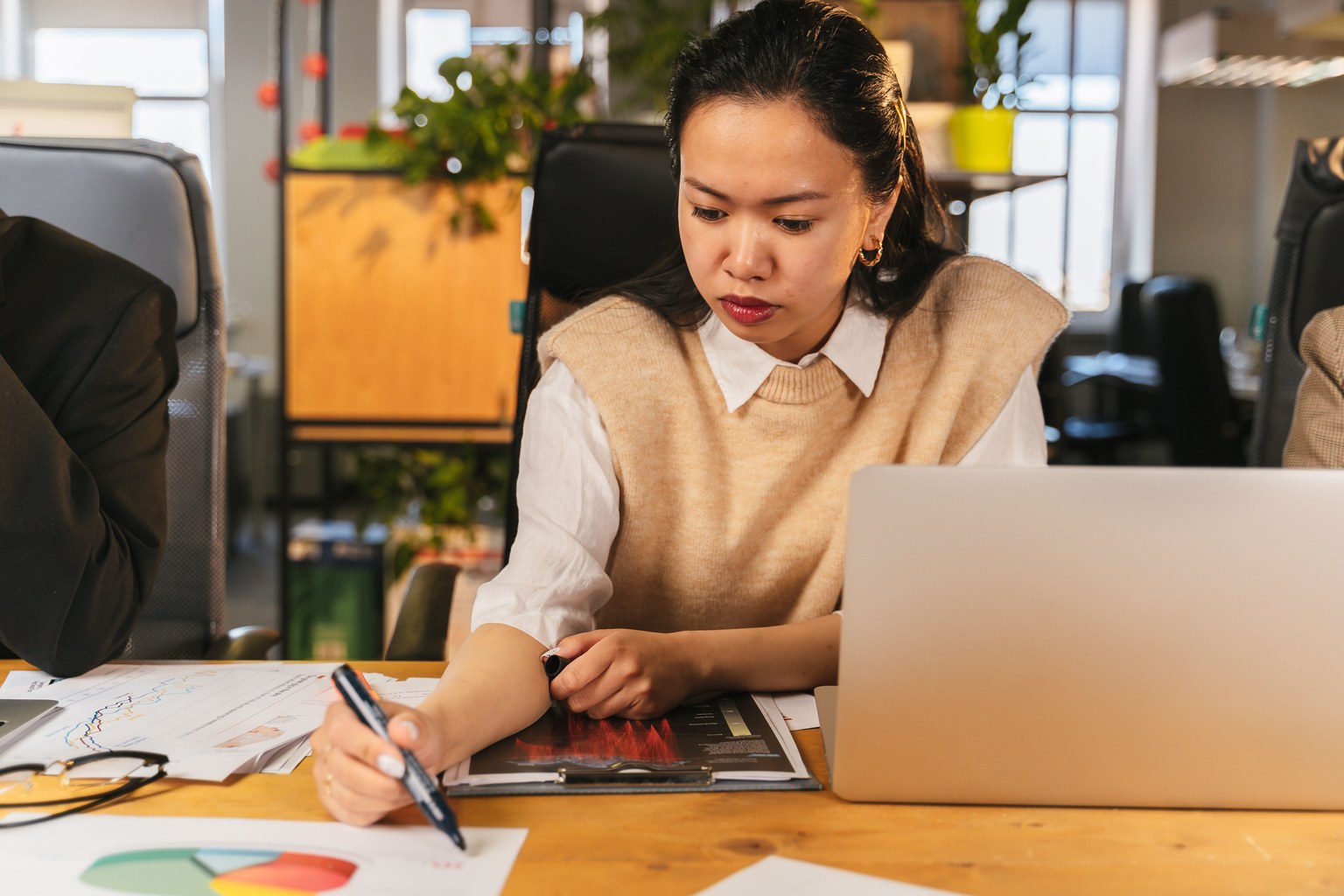 A professional reviewing business figures