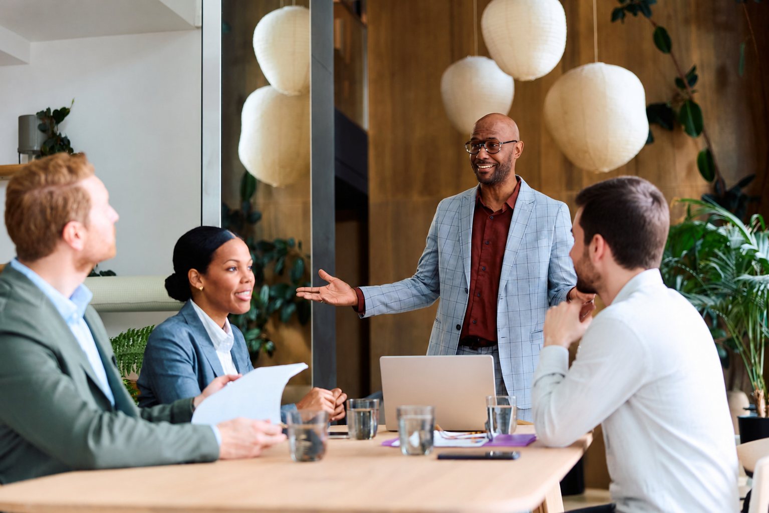 A manager leading a team discussion